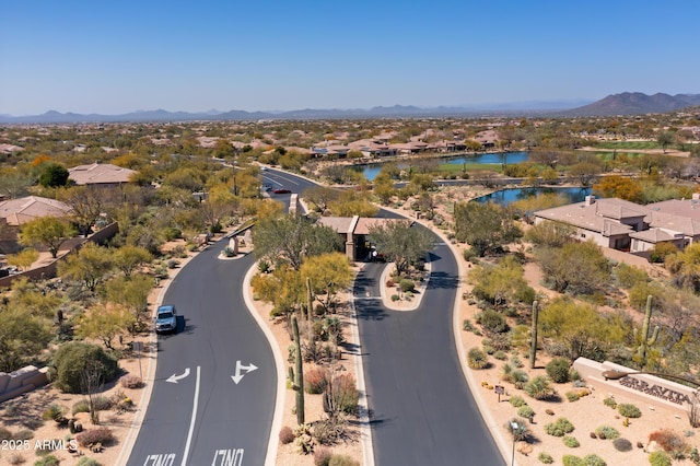 bird's eye view featuring a water and mountain view