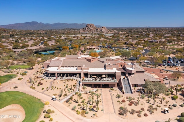 birds eye view of property featuring a mountain view