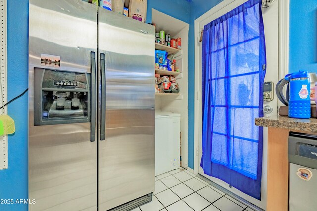 8111 W Wacker Rd Unit 62, Peoria, AZ 85381 - kitchen featuring stainless steel refrigerator with ice dispenser and tile patterned floors