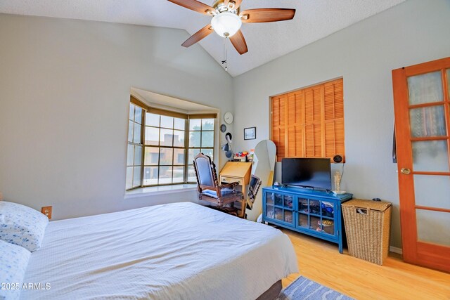 8111 W Wacker Rd Unit 62, Peoria, AZ 85381 - bedroom with wood finished floors, lofted ceiling, and a ceiling fan