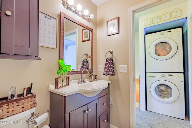 8111 W Wacker Rd Unit 62, Peoria, AZ 85381 - bathroom with stacked washer / drying machine, vanity, and toilet