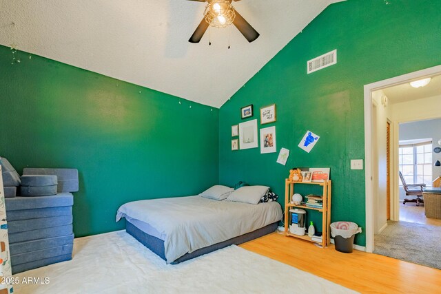 8111 W Wacker Rd Unit 62, Peoria, AZ 85381 - bedroom featuring wood finished floors, vaulted ceiling, a ceiling fan, and baseboards