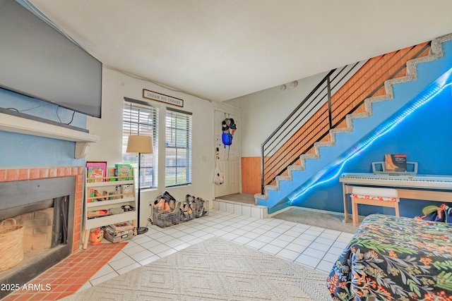 8111 W Wacker Rd Unit 62, Peoria, AZ 85381 - foyer entrance with stairway, tile patterned flooring, and a brick fireplace