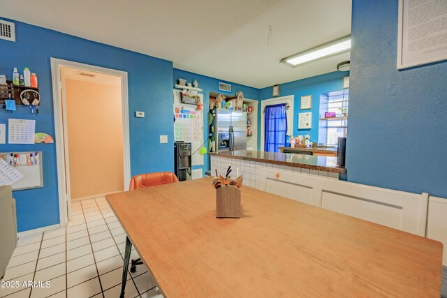 8111 W Wacker Rd Unit 62, Peoria, AZ 85381 - dining room featuring light tile patterned floors