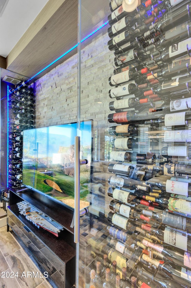 wine area featuring wood finished floors