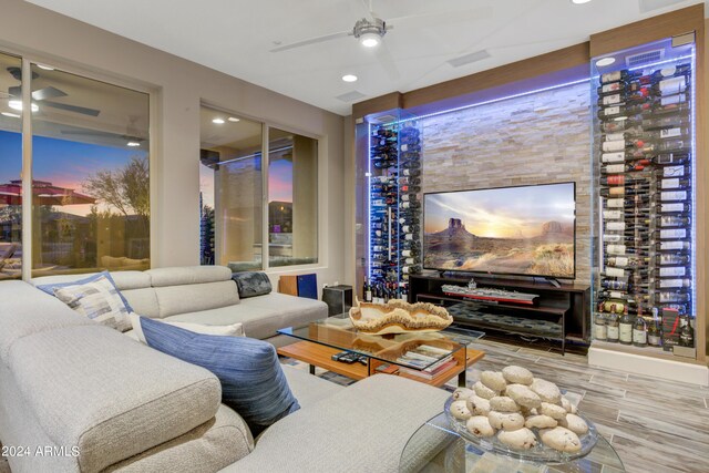 living room with recessed lighting, ceiling fan, and wood finished floors