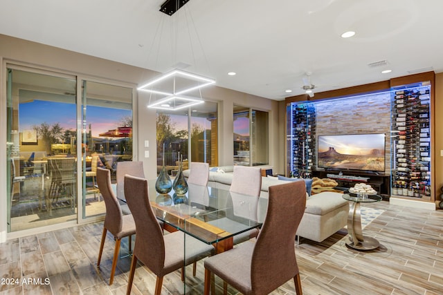 dining area featuring recessed lighting, visible vents, and wood finish floors