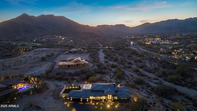 aerial view at dusk with a mountain view