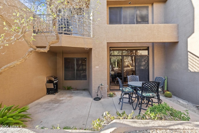 rear view of house featuring a patio area