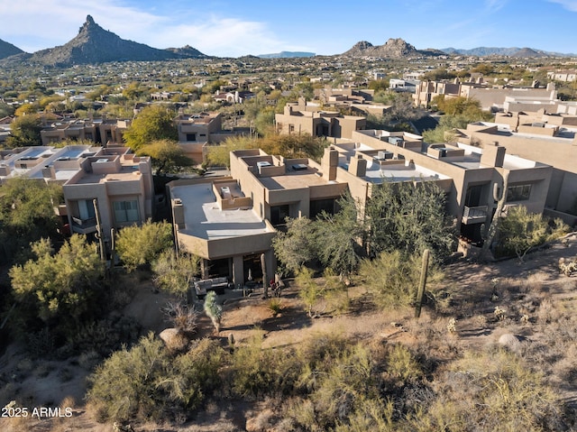 drone / aerial view featuring a mountain view