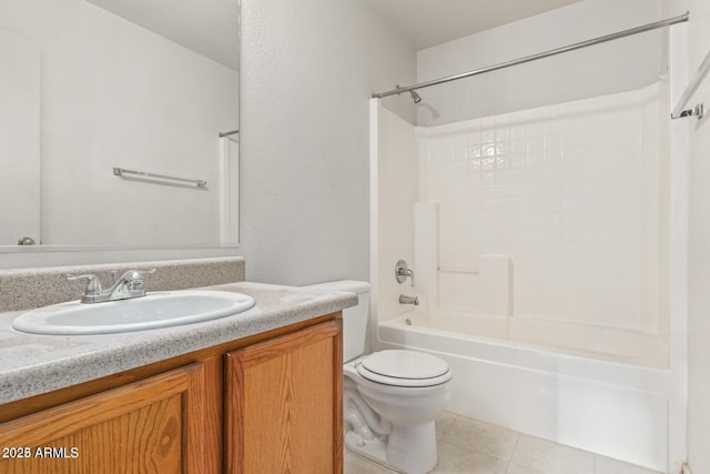 full bathroom featuring tile patterned floors, vanity, toilet, and shower / tub combination