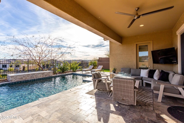 exterior space featuring an outdoor living space, a fenced in pool, and ceiling fan