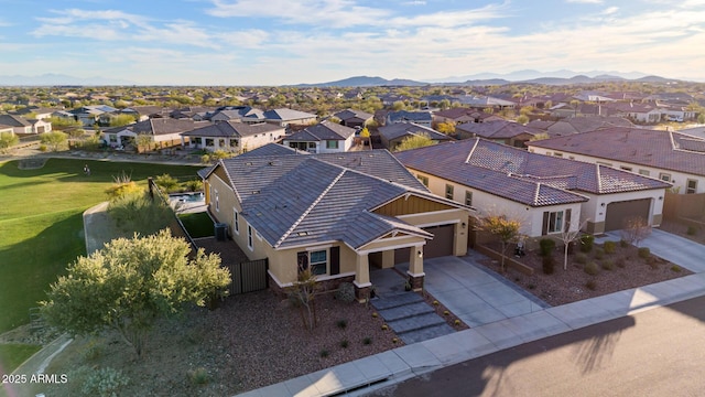 drone / aerial view featuring a mountain view