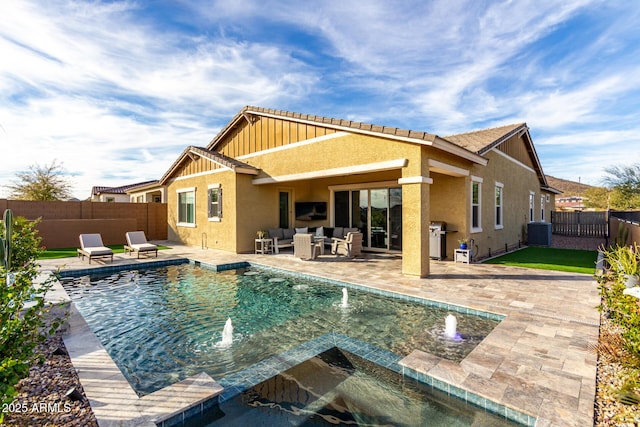 rear view of property with central AC, a fenced in pool, and a patio