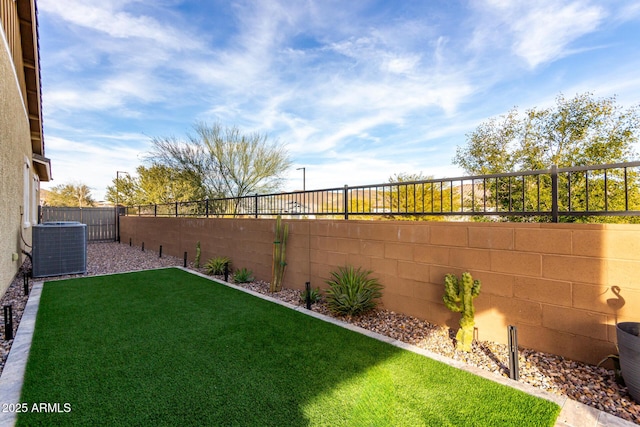 view of yard featuring central AC