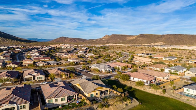 birds eye view of property featuring a mountain view