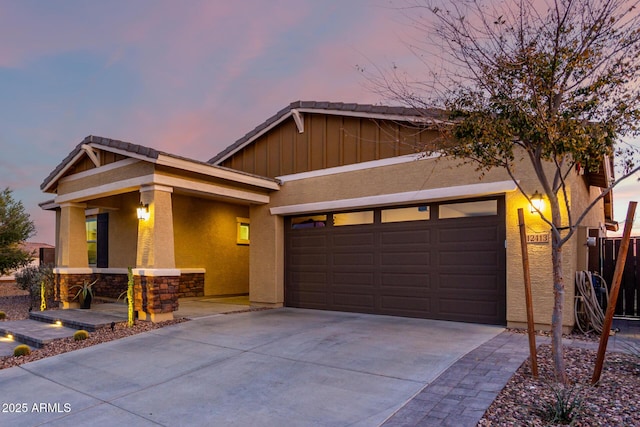 view of front of property featuring a garage