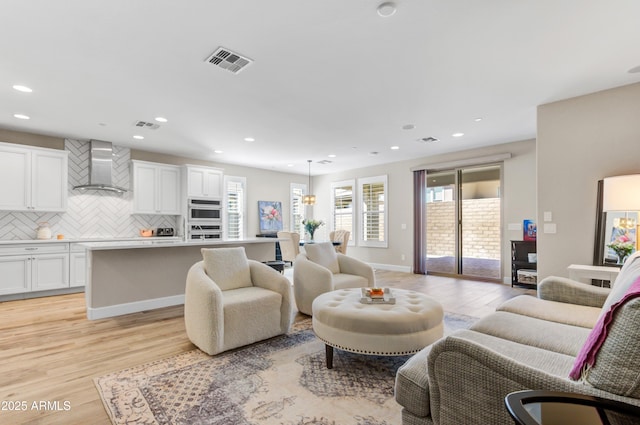 living room featuring light hardwood / wood-style floors