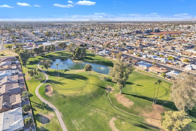 aerial view with view of golf course, a water view, and a residential view