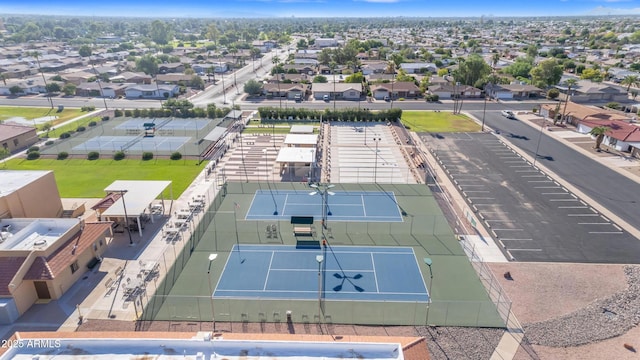 birds eye view of property with a residential view