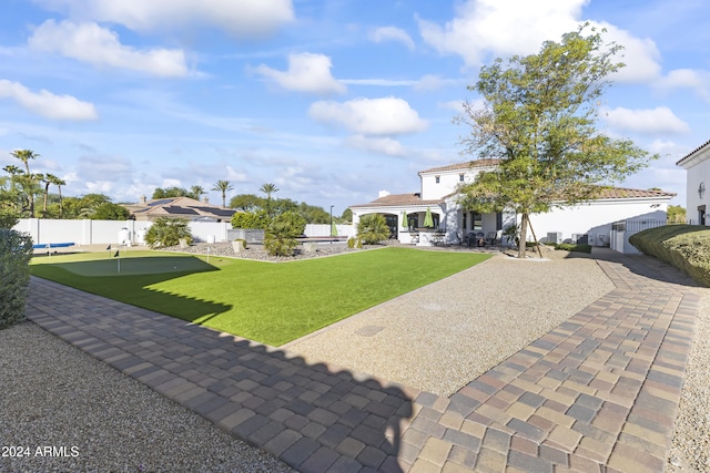 10125 E Cortez Dr, Scottsdale, AZ 85260 - fenced backyard with a putting green and a patio