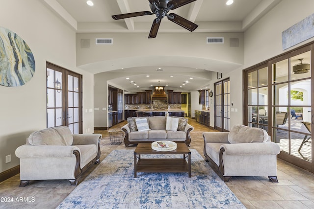 10125 E Cortez Dr, Scottsdale, AZ 85260 - living room with french doors, a high ceiling, ceiling fan, recessed lighting, and coffered ceiling