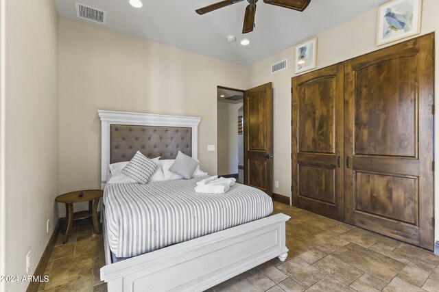 10125 E Cortez Dr, Scottsdale, AZ 85260 - bedroom featuring stone finish floors, ceiling fan, and recessed lighting