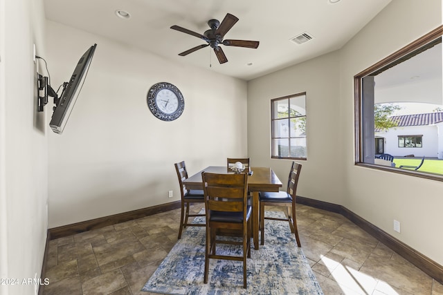 10125 E Cortez Dr, Scottsdale, AZ 85260 - dining space featuring stone finish flooring, ceiling fan, and recessed lighting