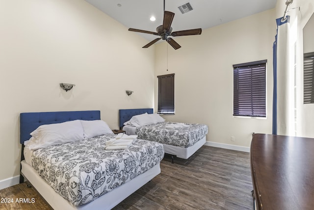 10125 E Cortez Dr, Scottsdale, AZ 85260 - bedroom with dark wood-style flooring, high vaulted ceiling, and a ceiling fan