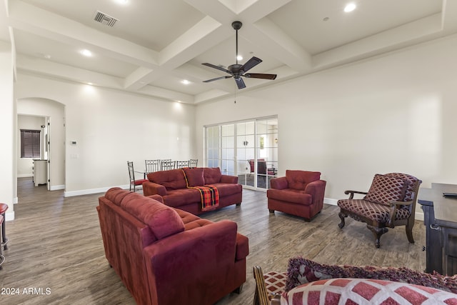 10125 E Cortez Dr, Scottsdale, AZ 85260 - living area featuring a ceiling fan, coffered ceiling, wood finished floors, beam ceiling, and arched walkways
