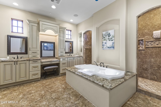 10125 E Cortez Dr, Scottsdale, AZ 85260 - bathroom featuring a bath, vanity, and plenty of natural light