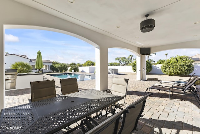 10125 E Cortez Dr, Scottsdale, AZ 85260 - view of patio / terrace with exterior kitchen and outdoor dining space