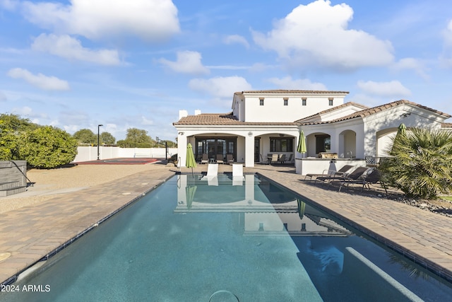 10125 E Cortez Dr, Scottsdale, AZ 85260 - back of property with a patio area, stucco siding, and a tiled roof