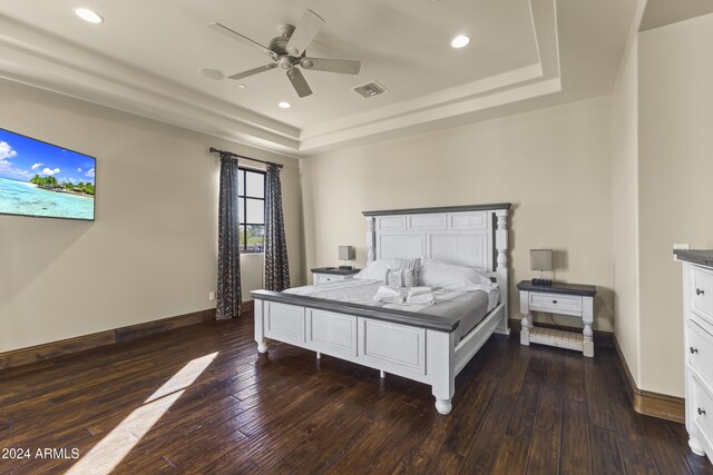 10125 E Cortez Dr, Scottsdale, AZ 85260 - bedroom with a tray ceiling, dark wood-type flooring, recessed lighting, and ceiling fan