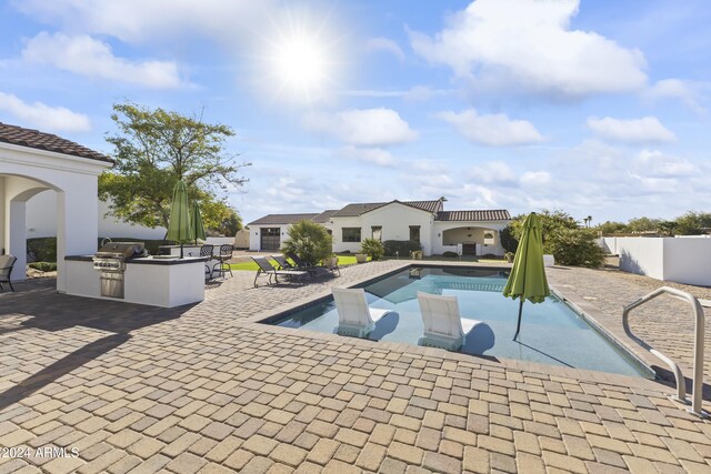 10125 E Cortez Dr, Scottsdale, AZ 85260 - view of pool with area for grilling and a patio area
