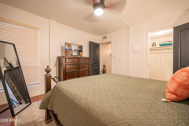 bedroom featuring hardwood / wood-style flooring and ceiling fan