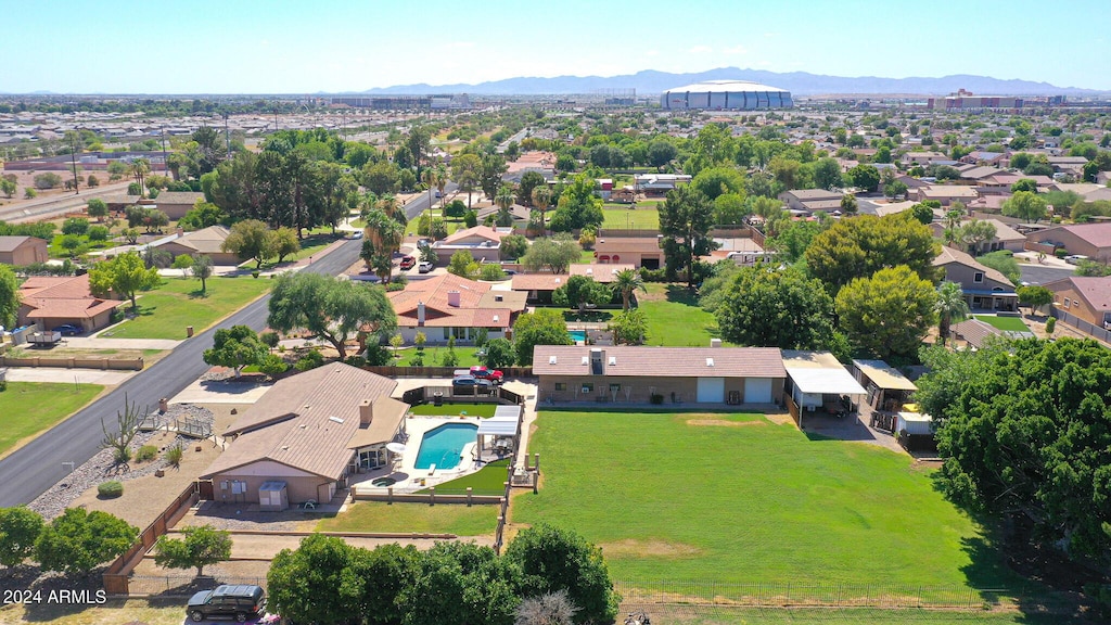 drone / aerial view featuring a mountain view