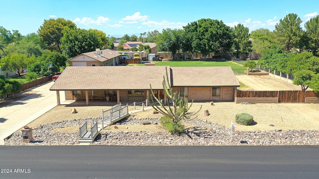 view of front of house featuring an outbuilding