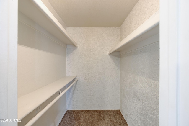 laundry room with washer / dryer and light tile patterned floors