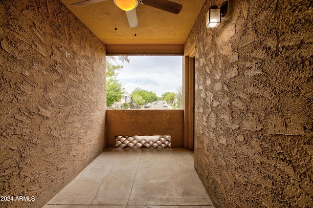 view of patio / terrace featuring ceiling fan and a balcony