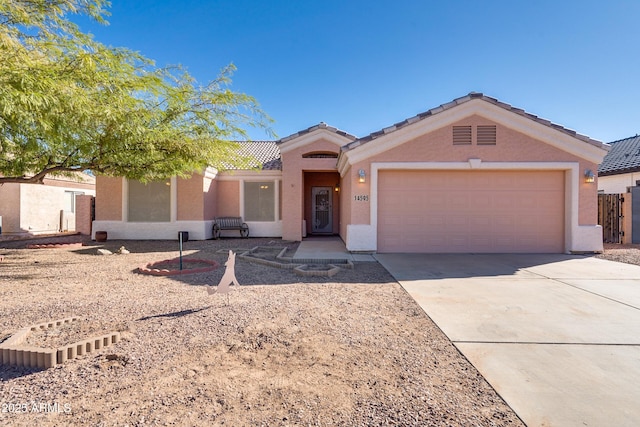 view of front of property with a garage