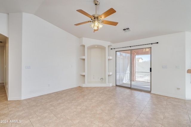 unfurnished room with ceiling fan