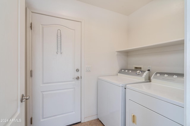 laundry area with washing machine and dryer