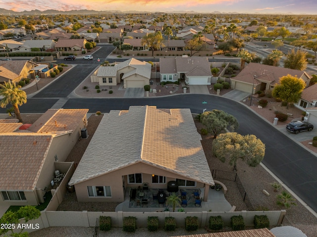 aerial view at dusk with a residential view