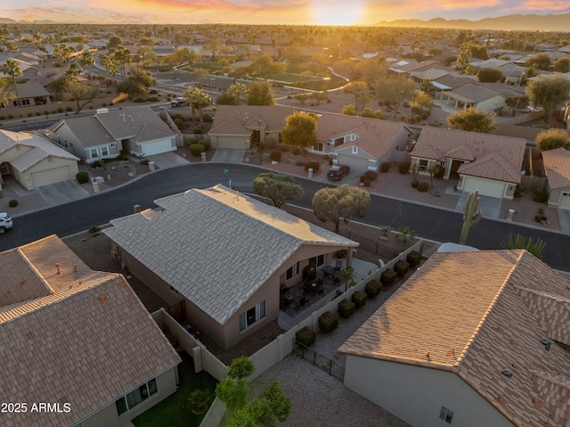 aerial view at dusk with a residential view