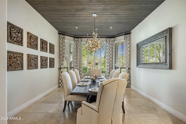 dining area with a notable chandelier and wood ceiling