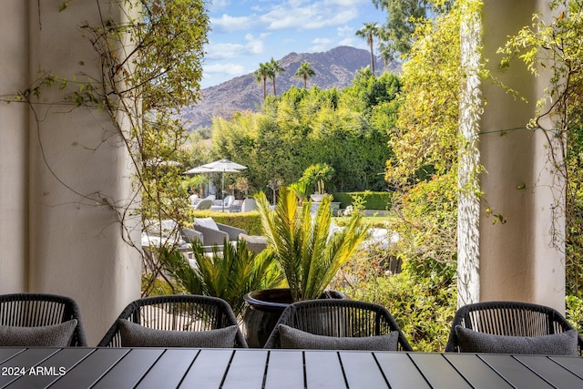 balcony featuring a mountain view