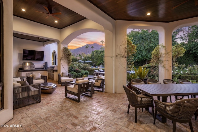 view of patio with ceiling fan and an outdoor hangout area