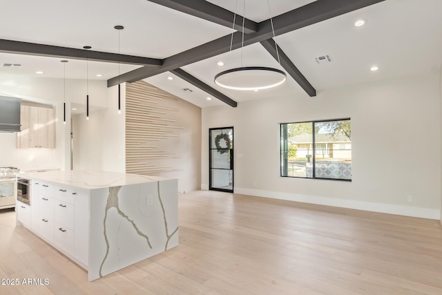 interior space with vaulted ceiling with beams, light wood-type flooring, and visible vents