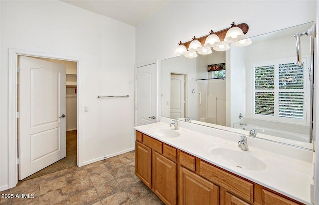 bathroom with vanity and separate shower and tub